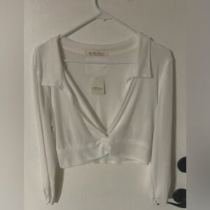 “WE THE FREE” adorable crop top. Brand new. Size L. You’re going to love it